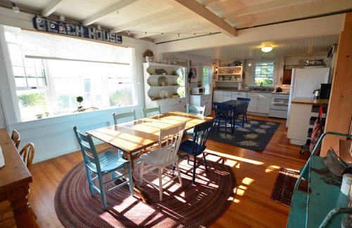 Spruce Head Cabaña | Berry Cottage, private dock, overlooking a sandy beach and bustling harbor