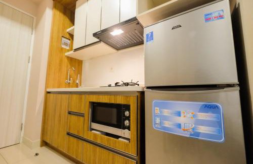 Bekasi Barat Apartamento | Best Furnished Studio Grand Kamala Lagoon Apartment By Travelio