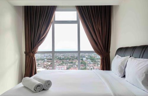 Panakkukang Apartamento | Big and Comfy 3BR at Vida View Apartement By Travelio