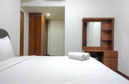 Panakkukang Apartamento | Big and Comfy 3BR at Vida View Apartement By Travelio