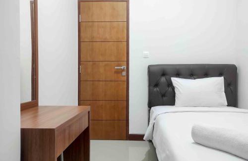Panakkukang Apartamento | Big and Comfy 3BR at Vida View Apartement By Travelio