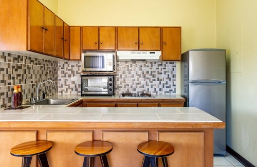 Playa Flamingo Condominio | Birds-eye Ocean View in Nicely Priced Top-floor Unit in Flamingo