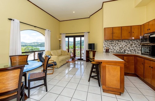 Playa Flamingo Condominio | Birds-eye Ocean View in Nicely Priced Top-floor Unit in Flamingo