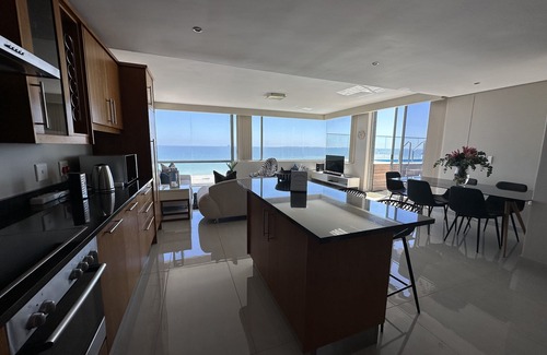Bloubergstrand Apartamento | Apartamento de lujo en la playa de Ciudad del Cabo con piscina privada en el patio y wifi gratuito