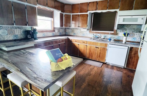 Edmore Casa | Blue Heron Point: Hot Tub, Fireplace, Lakefront, King Bed!