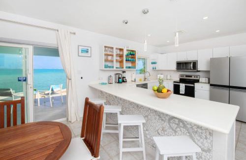 East End Casa | Blue Moon - A Divers Paradise in East End Next Door to Ocean Frontiers, Beach Cottage with Upgraded Interiors