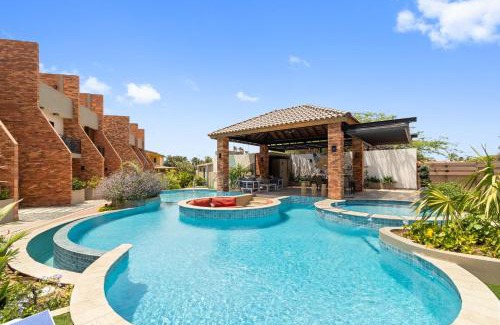 Tuscany Residence Aruba Apartamento | Bocobay Porta al Sole - Luxury Condos 5 min Walk to Ritz and Palm Beach