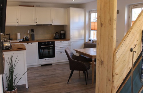 Born auf dem Darss Casa | La mitad de la casa de vacaciones Boddenkahn