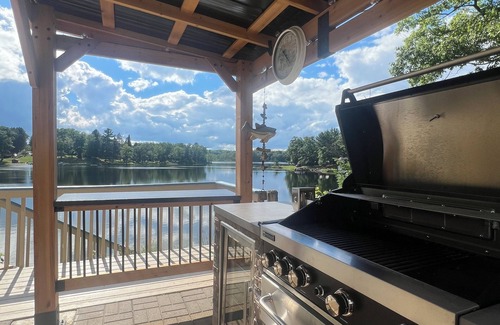 Curtis Township Casa | Breathtaking sunsets from sandy, eastern shore of North Lake!