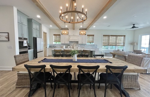 Gulf Breeze Casa | BREATHTAKING Waterfront Home with private dock and sunset vistas sleeps up to 24