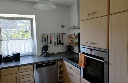 Kaan-Marienborn Apartamento | Bright and light-flooded apartment (80sqm) for 5 people with fireplace