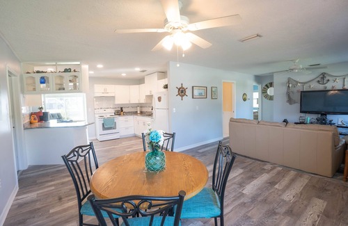 Gulf Cove Casa | Bright Waterfront Home. Heated Pool. Short drive to Beach. Beautiful Sunsets.