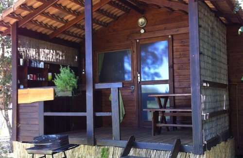 Petreto-Bicchisano Casa | Bungalows rodeados de naturaleza, piscina natural y jardín orgánico.