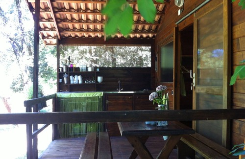 Petreto-Bicchisano Casa | Bungalows rodeados de naturaleza, piscina natural y jardín orgánico.