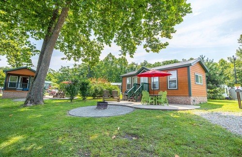 Dickerson Run Cabina | Cabin 4 - Stay like royalty. Sit on your concrete patio overlooking the beautiful Youghiogheny River.
