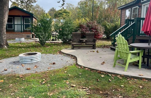 Dickerson Run Cabina | Cabin 4 - Stay like royalty. Sit on your concrete patio overlooking the beautiful Youghiogheny River.