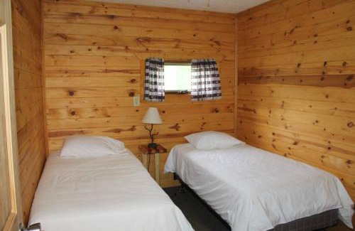 Deer River Casa | Cabin10 - Poolside Cabin with a lake view and great fishing