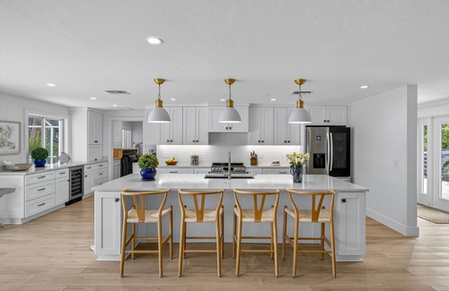 Sanibel Casa | Canal front ground level beauty steps to the beach