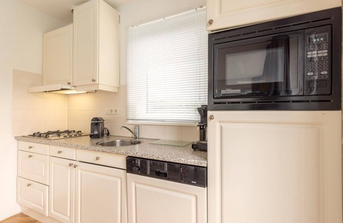 Eernewoude Casa | Estancia en bungalow junto al canal