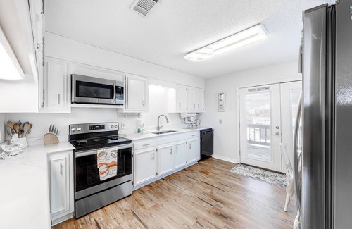 Royal Lagoons Casa | ¡NUEVO LISTADO! Canalside casa con espacio para un barco - a pocos pasos de la playa