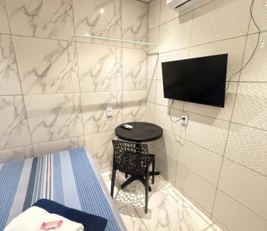 Alto da Boa Vista Casa | Cantinho aconchegante - Quarto 05 AR-condicionado