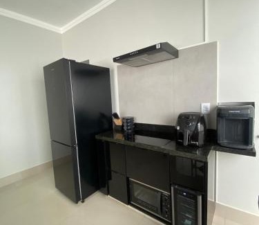Paracatu Casa | Casa com área gourmet e ar condicionado