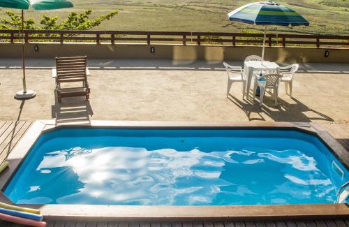 Garopaba Casa | Casa com piscina e incrível vista para lagoa