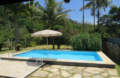 Maresias Casa | Casa da Josie em Maresias com piscina no pé da Mata Atlântica - 4 quartos