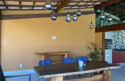 Enseada das Garcas Casa | Casa da Pampulha: Piscina com spa e Espaço Gourmet