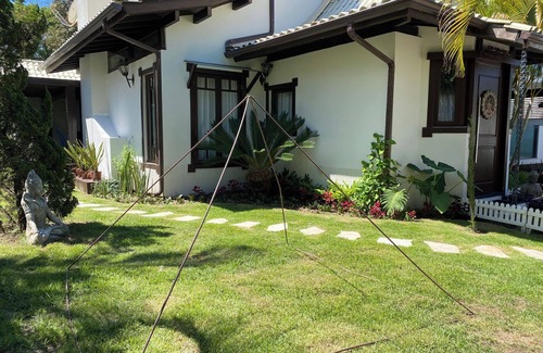 Porto da Lagoa Casa | Casa de Praia com Trilha Privativa em Condomínio Fechado