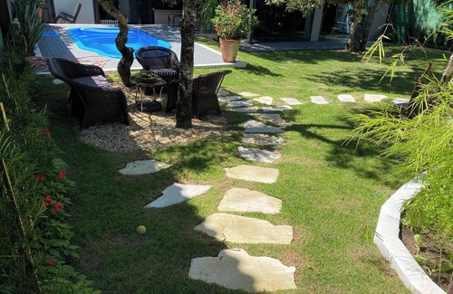 Porto da Lagoa Casa | Casa de Praia com Trilha Privativa em Condomínio Fechado