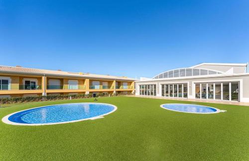Atalaia Apartamento | Casa Eva, golfe, conforto, piscina e spa