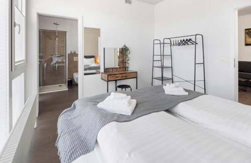 Langenthal Apartamento | Casa Milla, Apartment Wuhr - Zentrales Loft am Fluss mit Balkon & Parkplatz