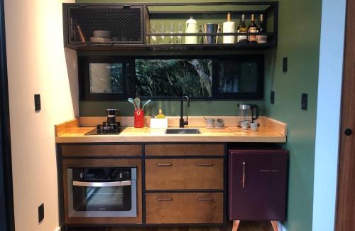 Vacas Gordas Cabina | Casa na árvore com banheira de imersão e lareira