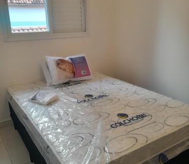 Real Casa | CASA NA PRAIA GRANDE pé na areia