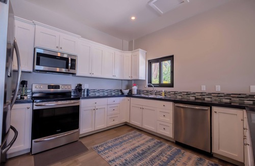 San Pedro Casa | Casa Paloma: Unwind in Style with Breathtaking Caribbean Views.