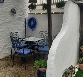 Benadalid Apartamento | Casa rural El Patio con chimenea, barbacoa, piscina, patios exteriores para sus mascotas de manera gratuita