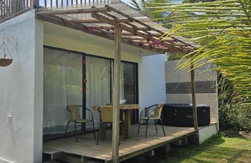 Monitos Casa | Casa Suite Palmar del viento FRENTE, FRENTE AL MAR by Amauna