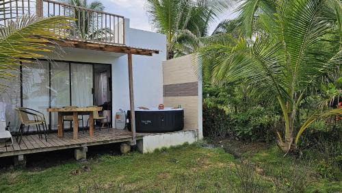 Monitos Casa | Casa Suite Palmar del viento FRENTE, FRENTE AL MAR by Amauna