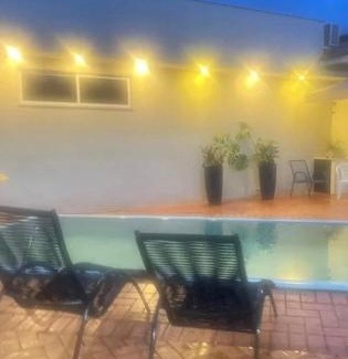 Tres Lagoas Casa | Casa Tropicale House accommodates family and work