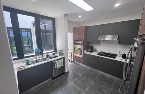 Heredia Casa | Casa13: Experience the joy of living in this delightful 3 bedroom house