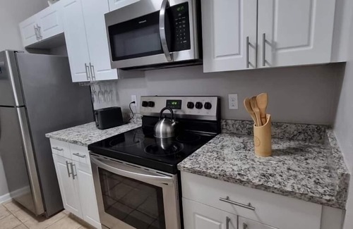 Windsor Palms Condominio | CasaComfort near Disney-King Suite bedroom, FREE Amenities, and great location.