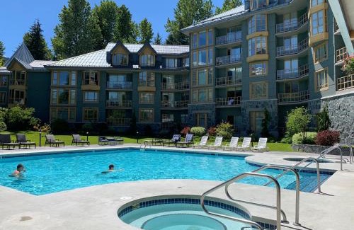 Village North Hotel | Cascade Lodge suite with 2 hot tubs pool gym sauna cable TV Wi-Fi