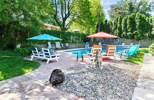 West Omaha Casa | Central Omaha Pool w/ Spa Oasis + Fire Pit + 3 Living Rooms