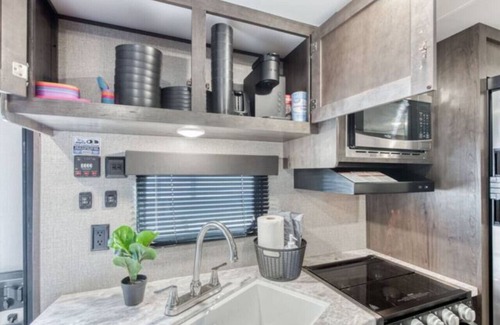 Tower District Casa | Cozy Retreat on Wheels: Charming RV Trailer