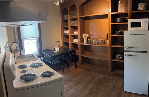 Camrose Casa | Century home suite located above a 5 star restaurant, In the heart of downtown!