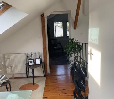 Le Landry Cama Y Desayuno | Chambre hôtes nichée sous les toits