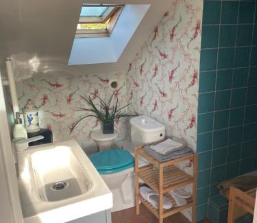 Le Landry Cama Y Desayuno | Chambre hôtes nichée sous les toits