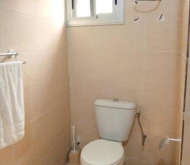 Adetikope Cama Y Desayuno | Chambre salon meublée