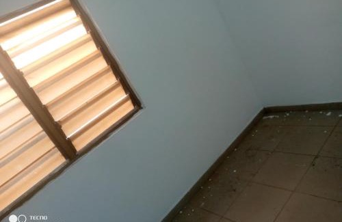 Adetikope Cama Y Desayuno | Chambre salon meublée